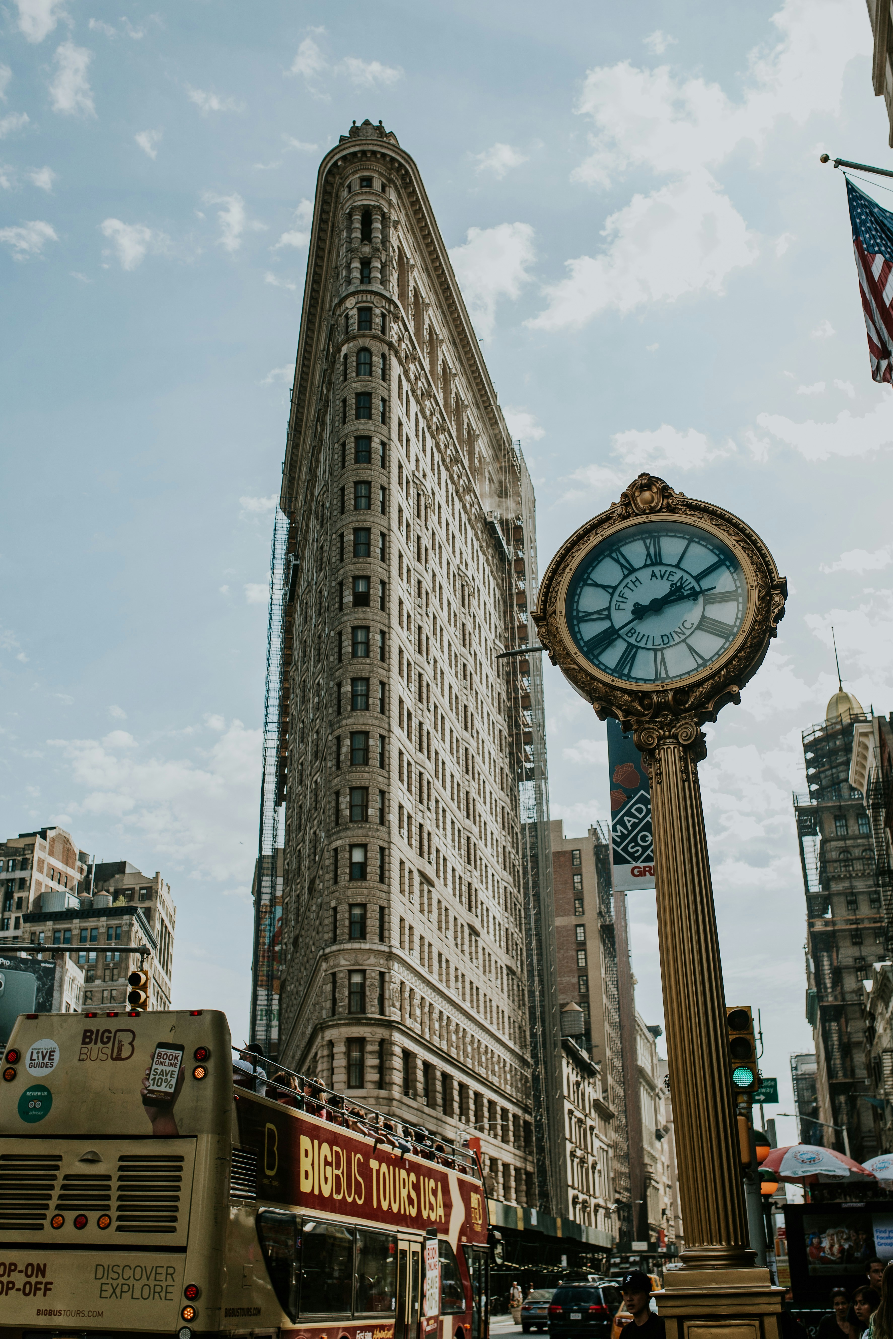 white and black analog clock at 11 00
