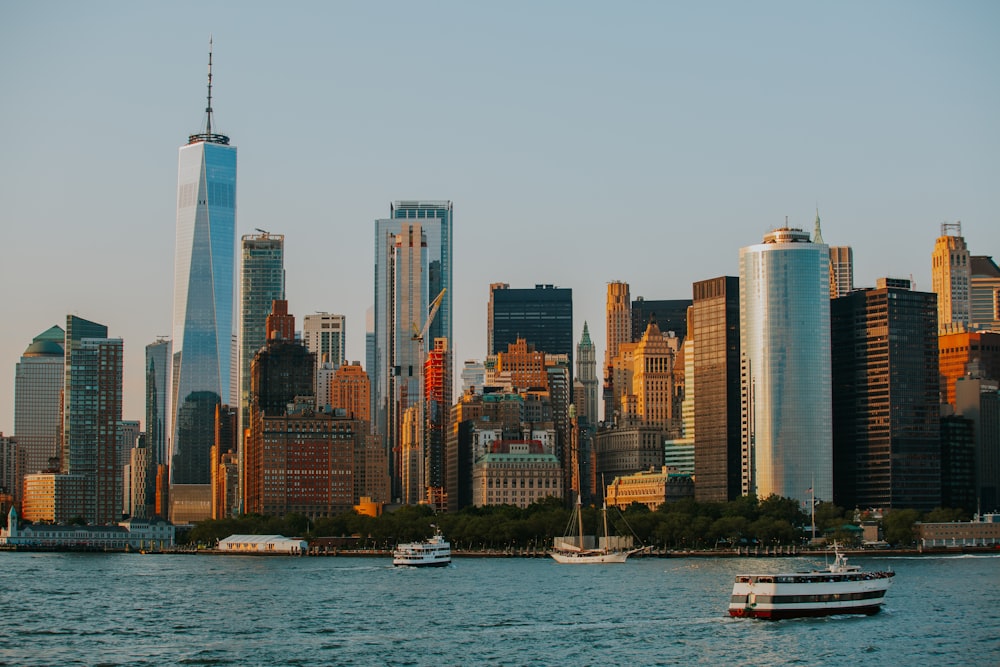 city skyline across body of water during daytime