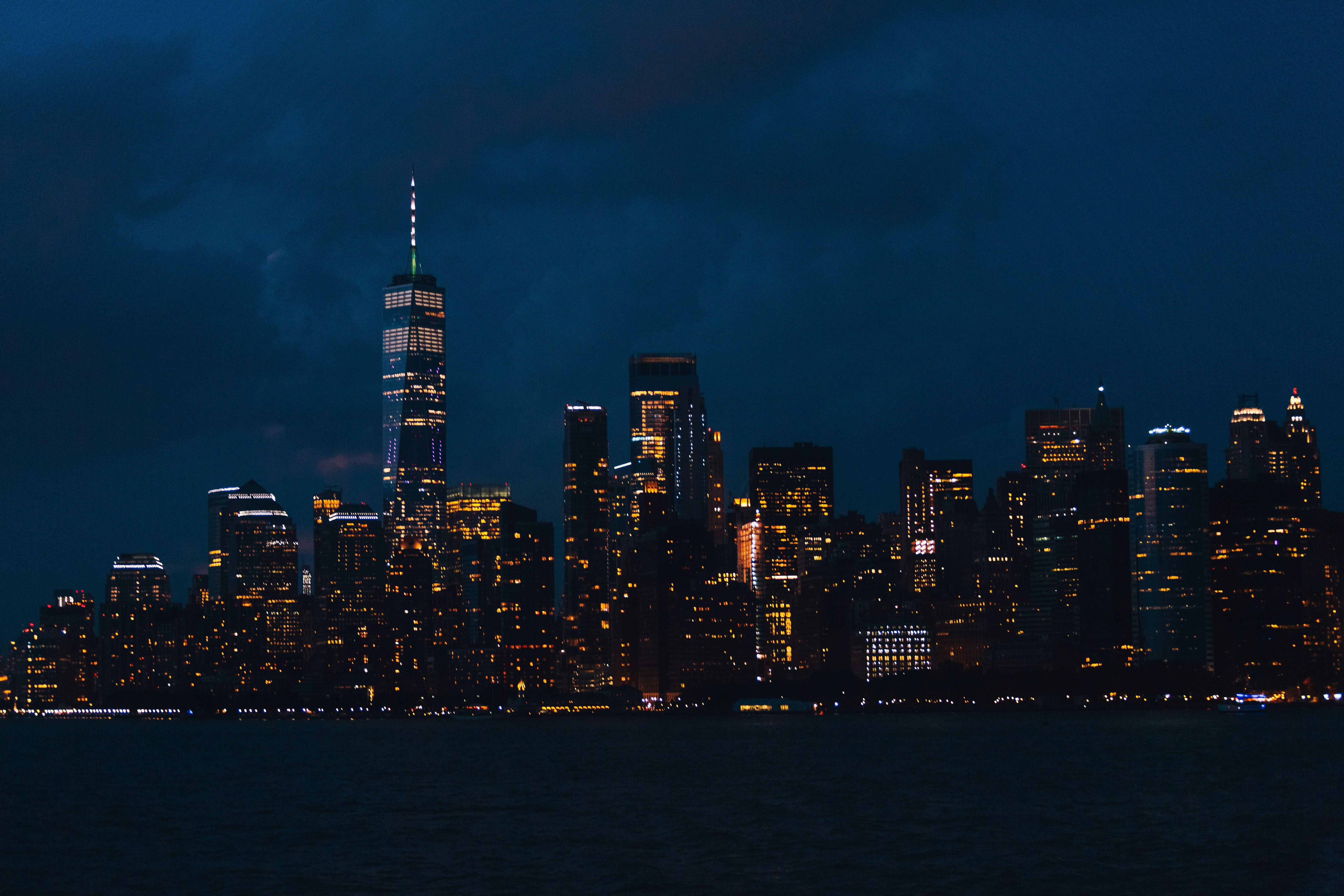 city skyline during night time