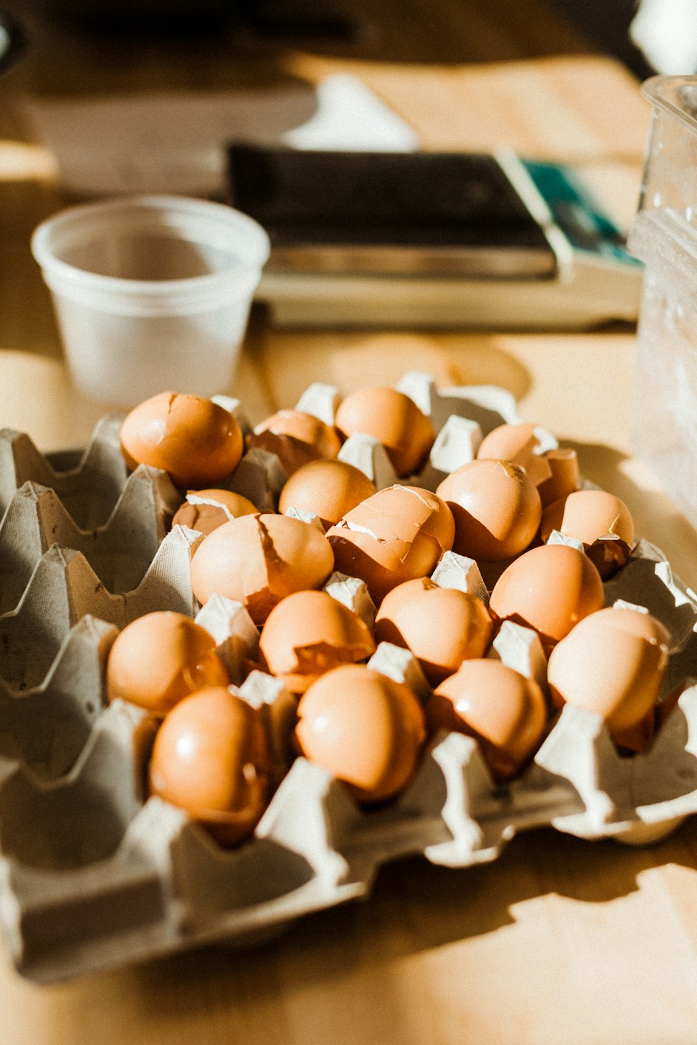 white and brown egg on white ceramic bowl