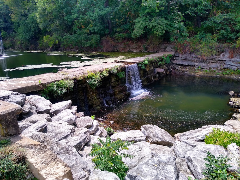 gray rocks on river during daytime