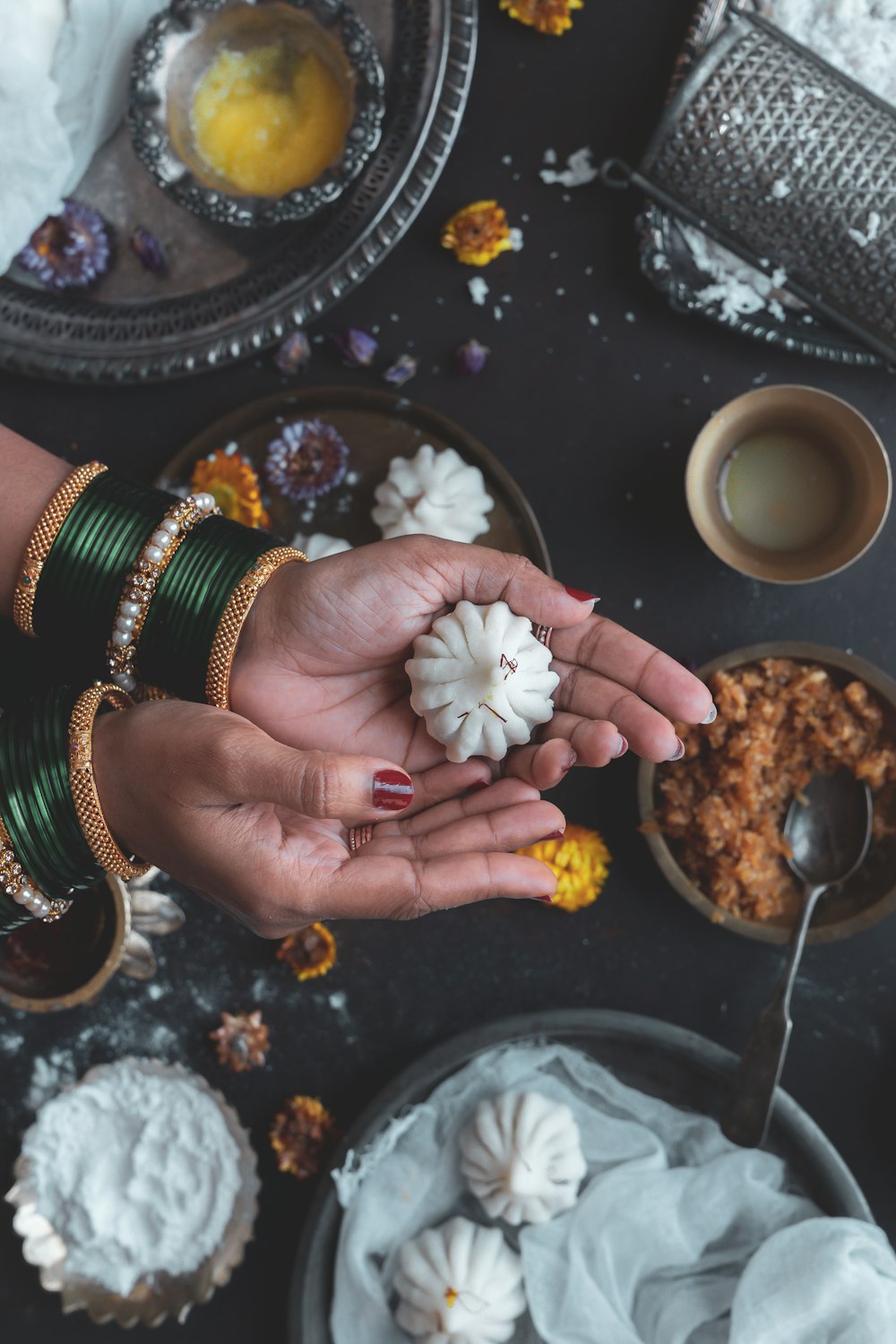 white flower on persons hand