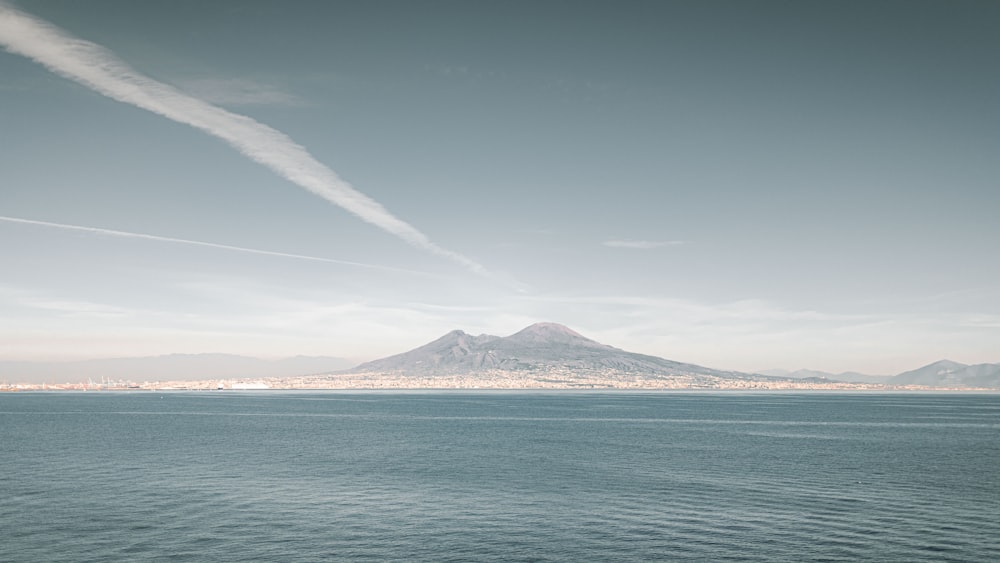 blue sea under blue sky during daytime