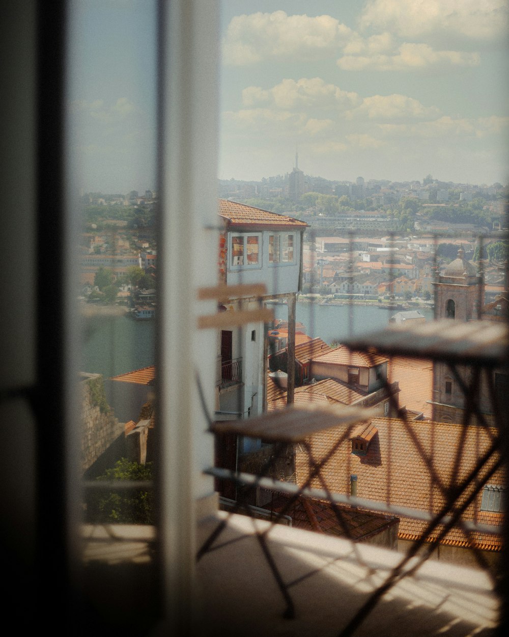 brown wooden table near window