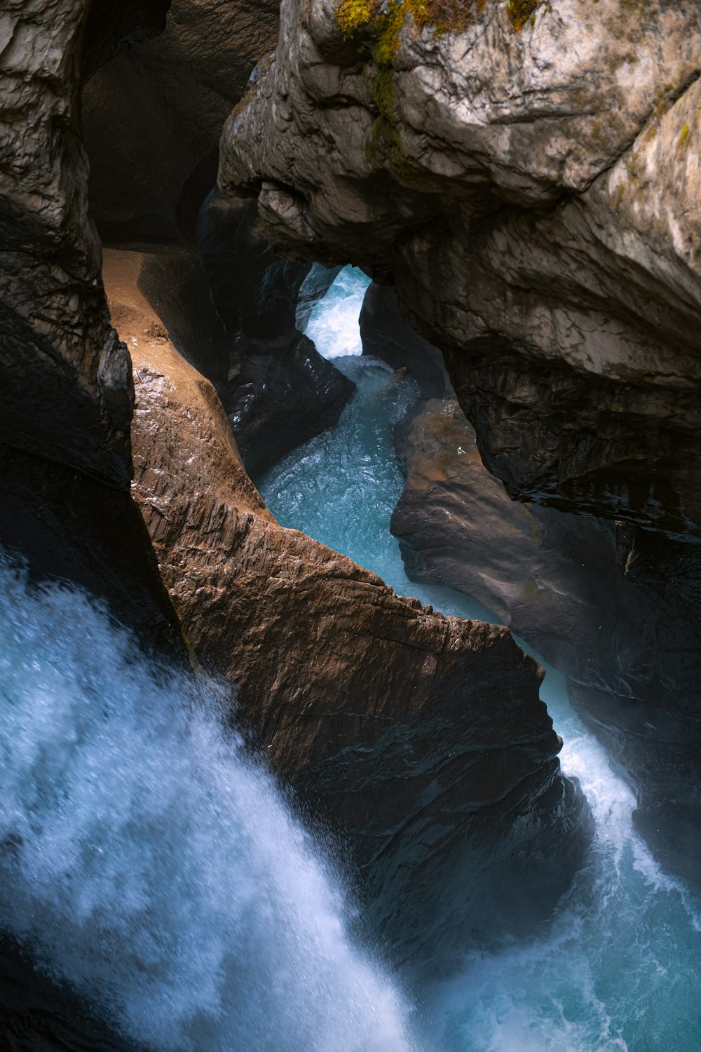 water falls on rocky mountain