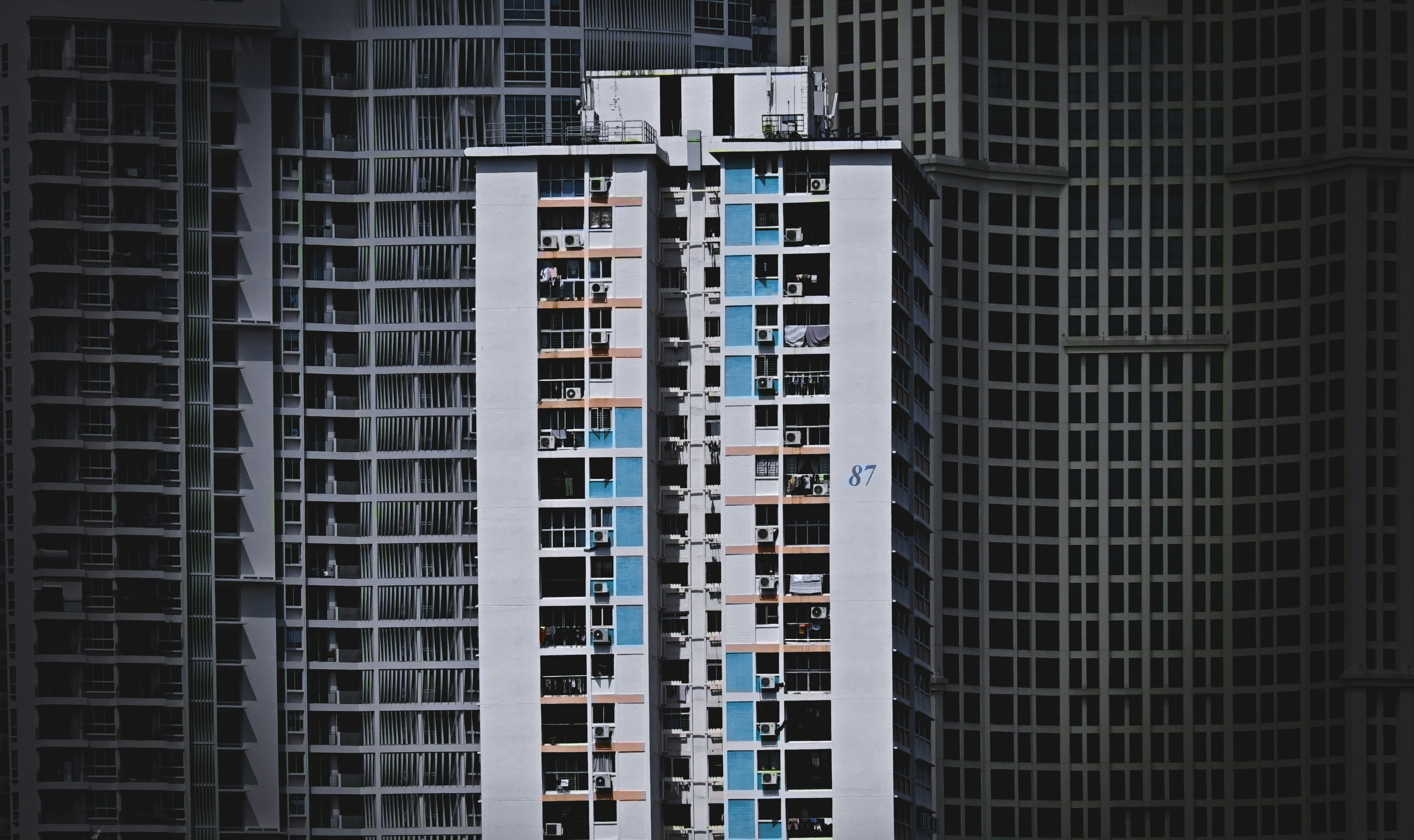 Modern compact electric SUV parked in an urban setting, similar in size to the Smart #1.