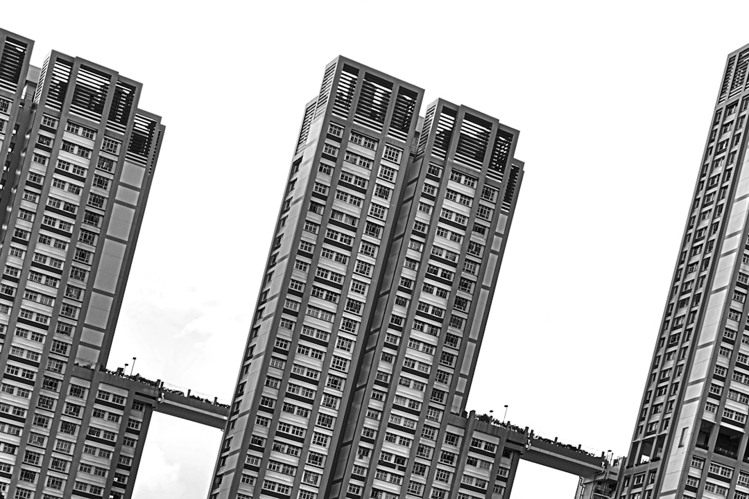 grayscale photo of high rise building