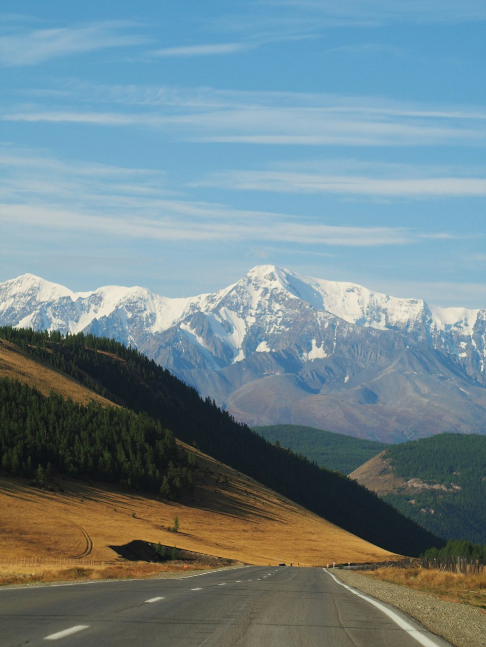 snow covered mountains under blue sky during daytime