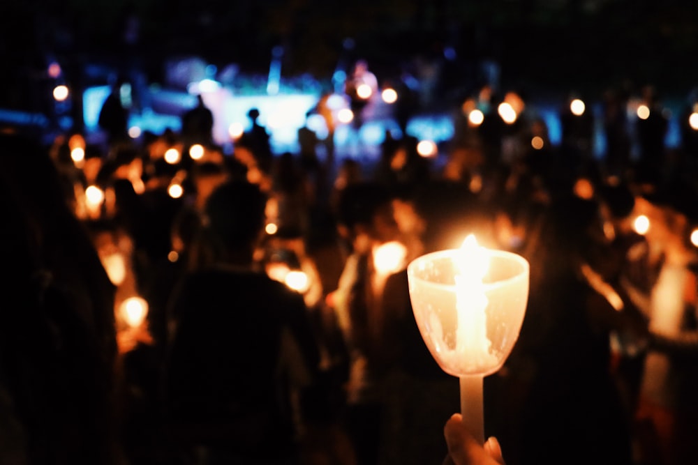 bokeh photography of lighted candle