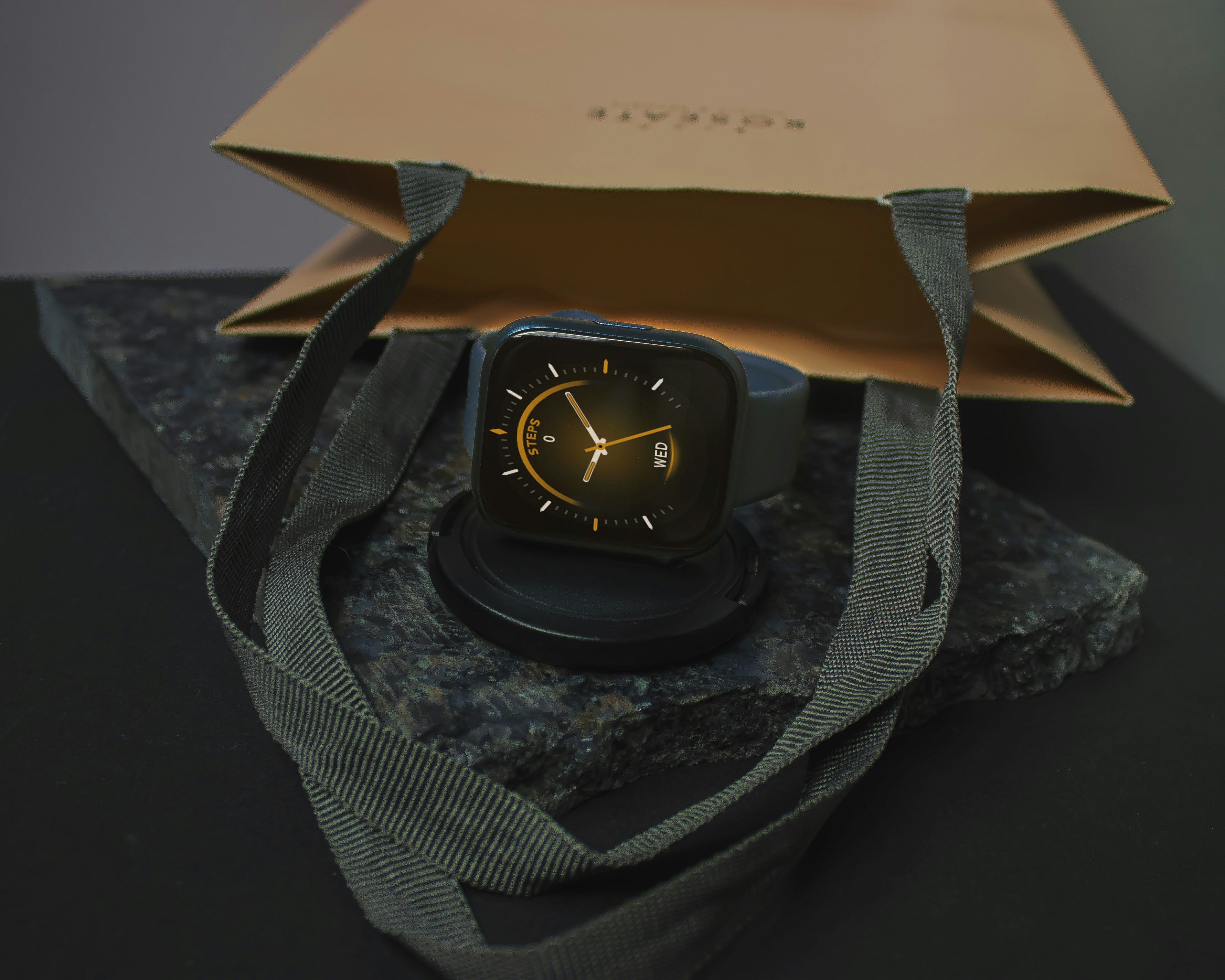 black and gold analog watch