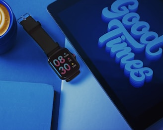 black apple watch with black sport band