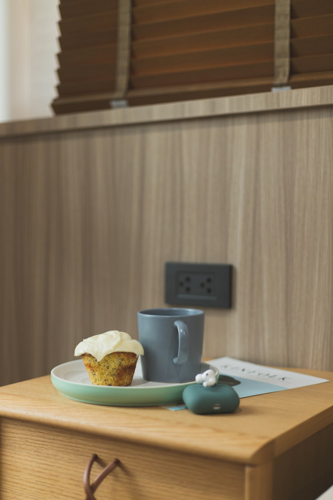 bread on plate beside cup of coffee