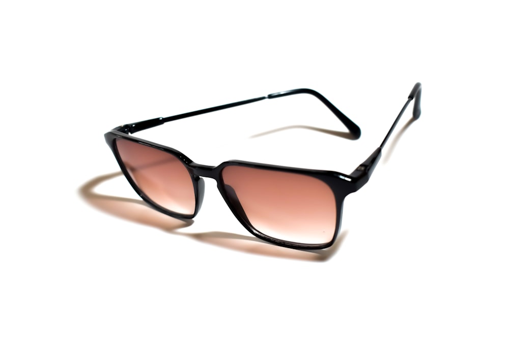black framed sunglasses on white background