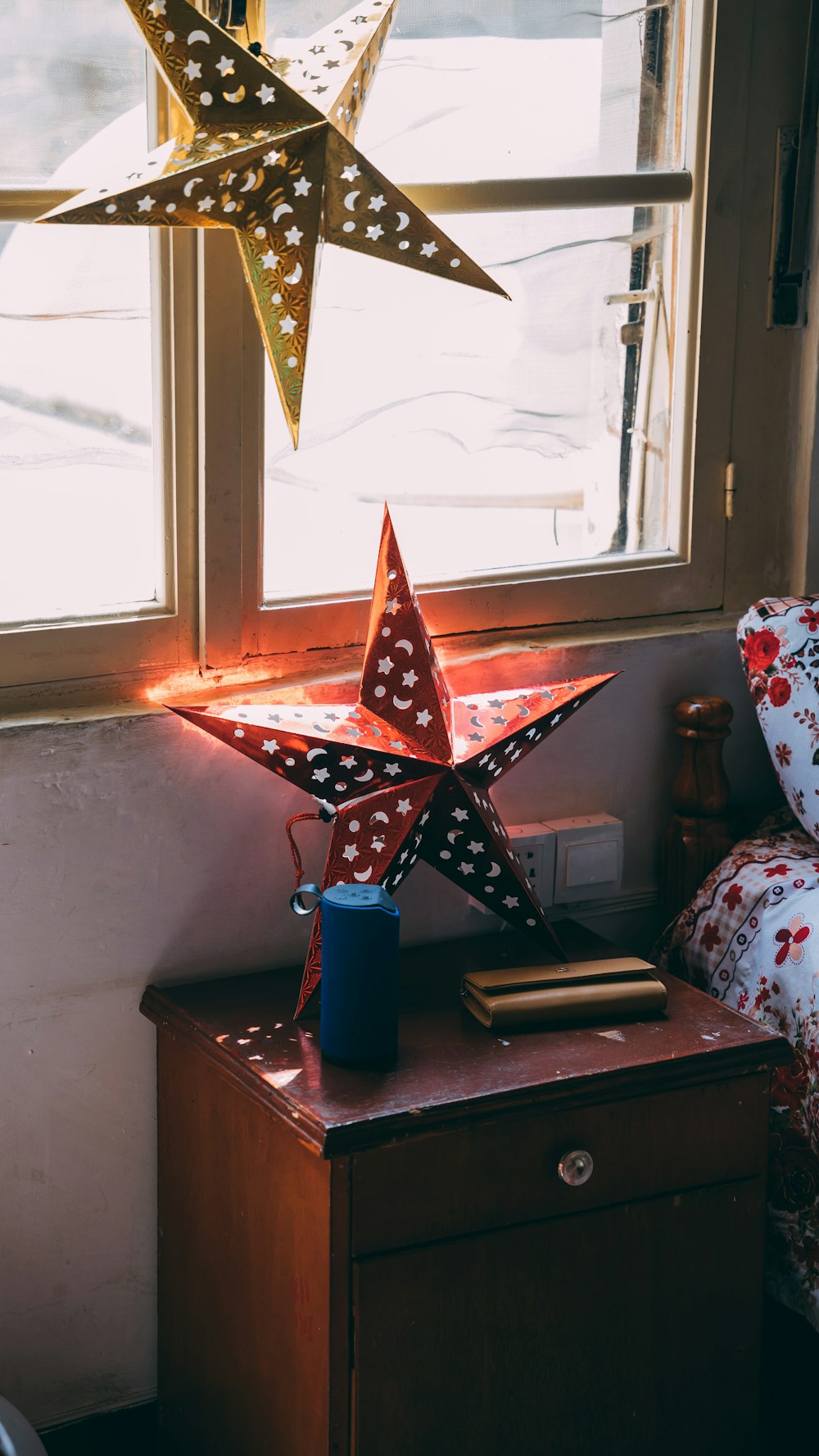 blue and white star paper decor on brown wooden table