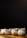 Several neatly arranged white dumplings rest on a wooden surface against a dark background. Their pleated shapes give them an appealing, handcrafted appearance.