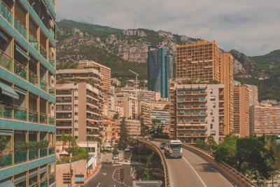 cars on road near buildings during daytime