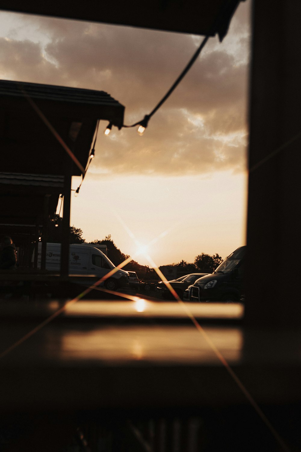 silhouette of house during sunset