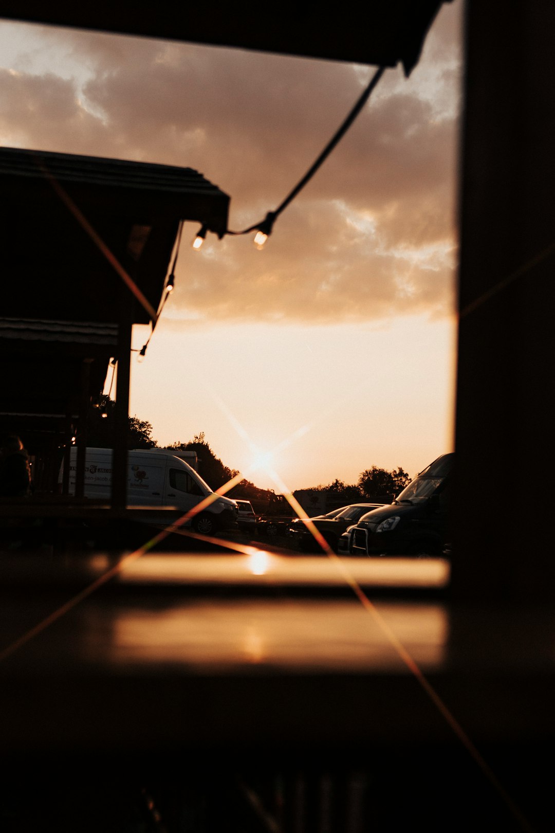 silhouette of house during sunset