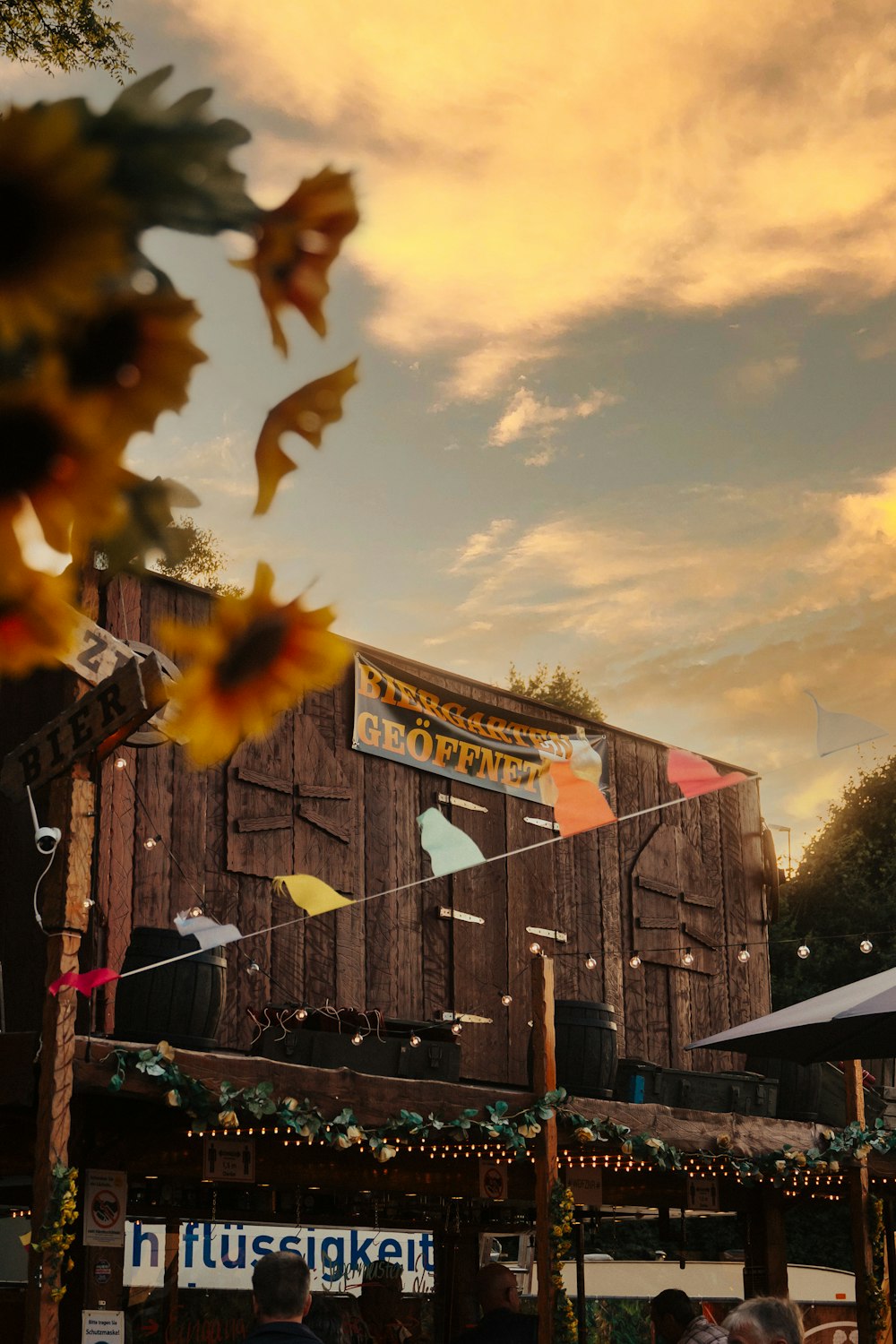 brown wooden house under cloudy sky during daytime