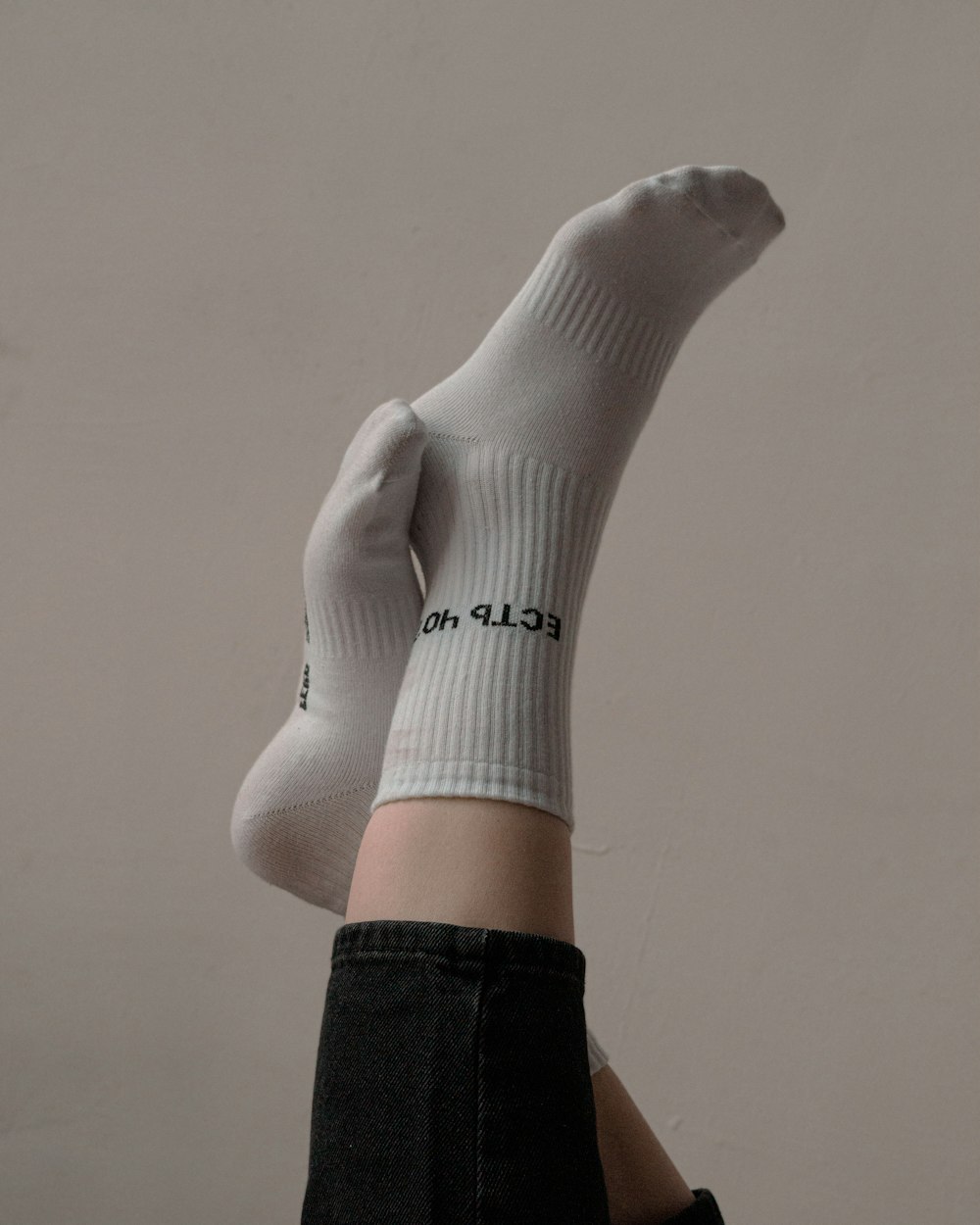 person wearing white nike sock