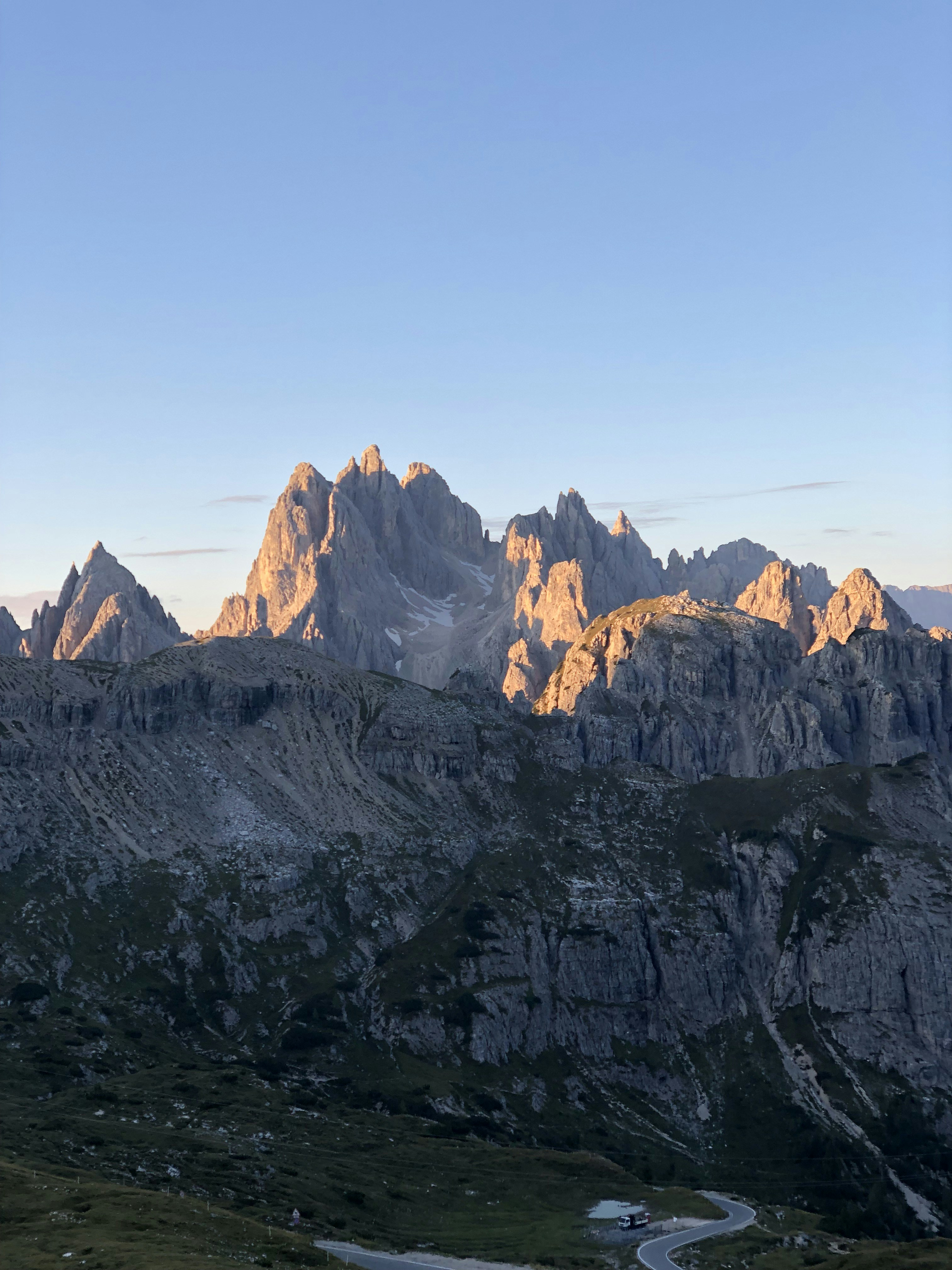 brown and white mountains under blue sky during daytime