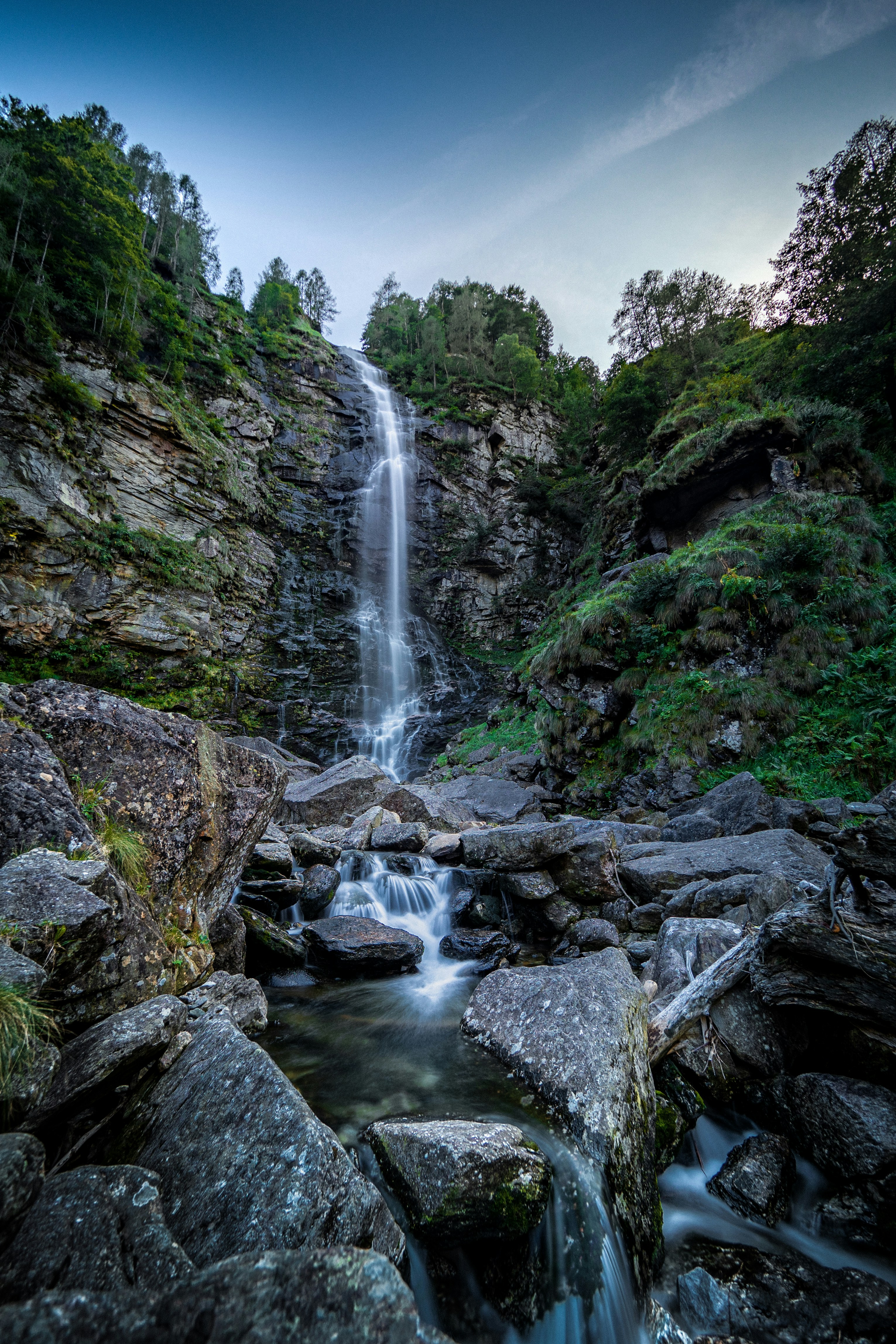 Waterfalls In The Middle Of Green Trees Photo Free Verzascatal Image On Unsplash