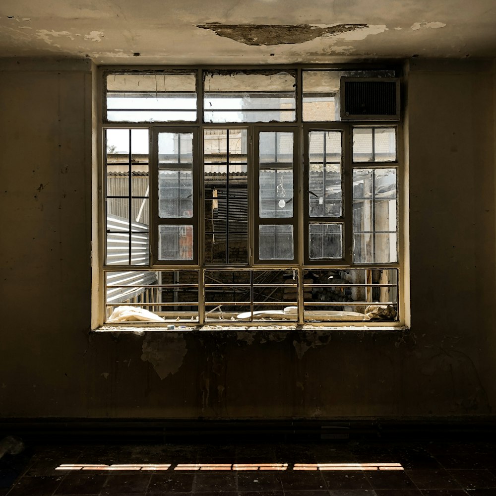 brown wooden framed glass window