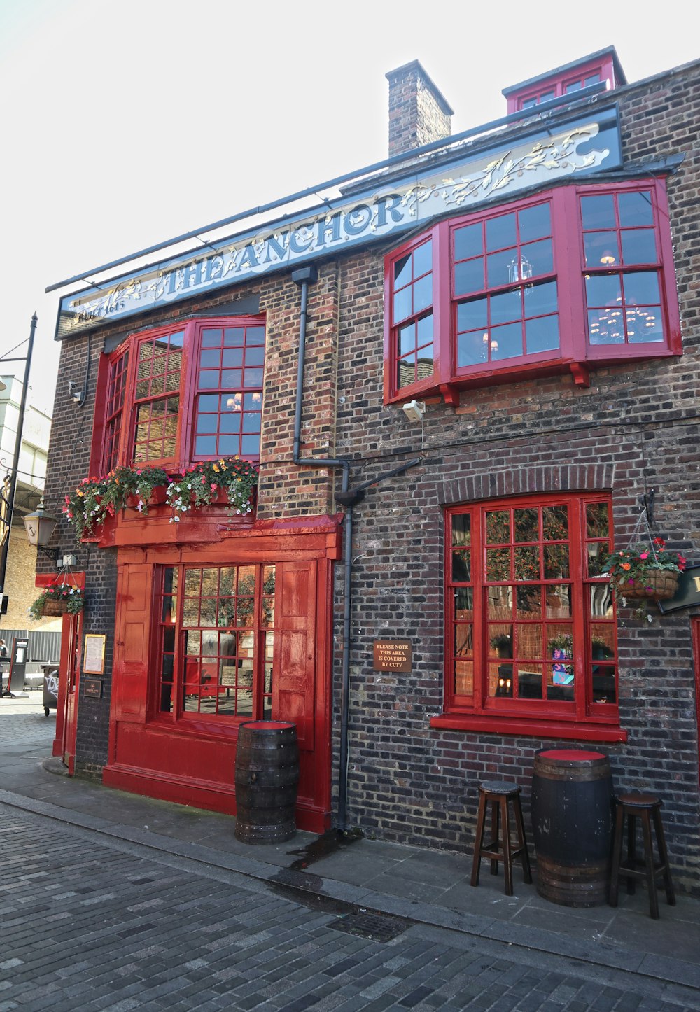 red brick building with red door