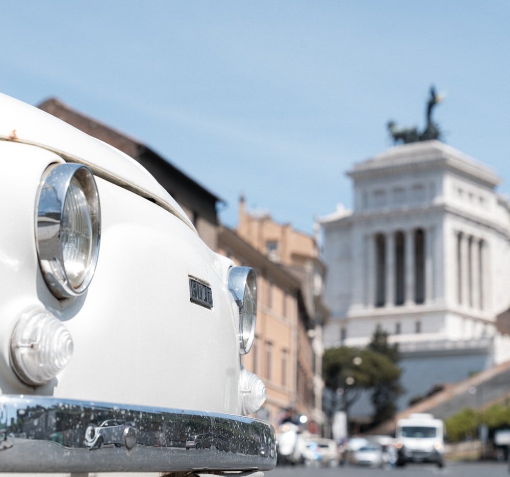 white car with gray round metal