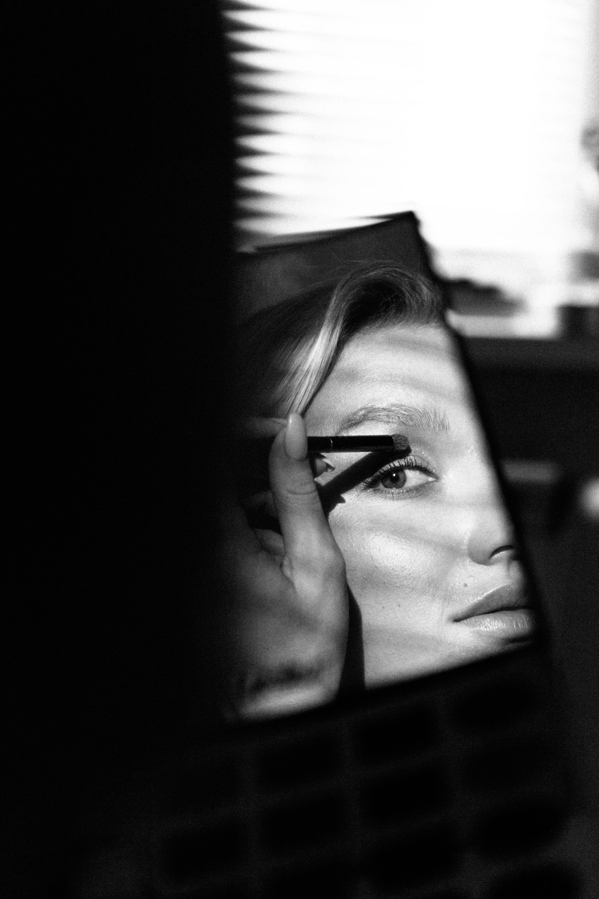womans face in grayscale photography