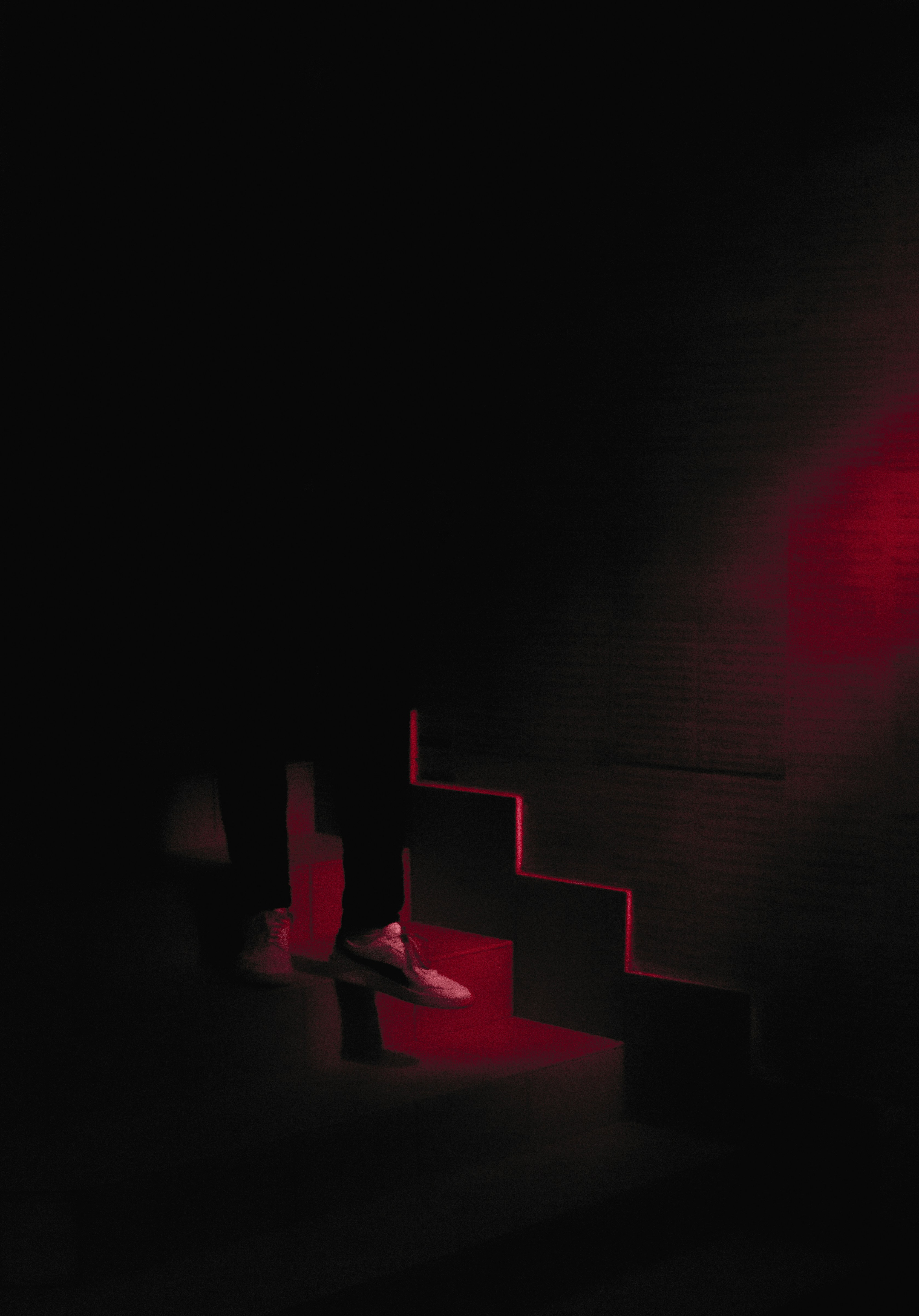 red and black stairs with red lights