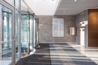 white and brown tiled hallway