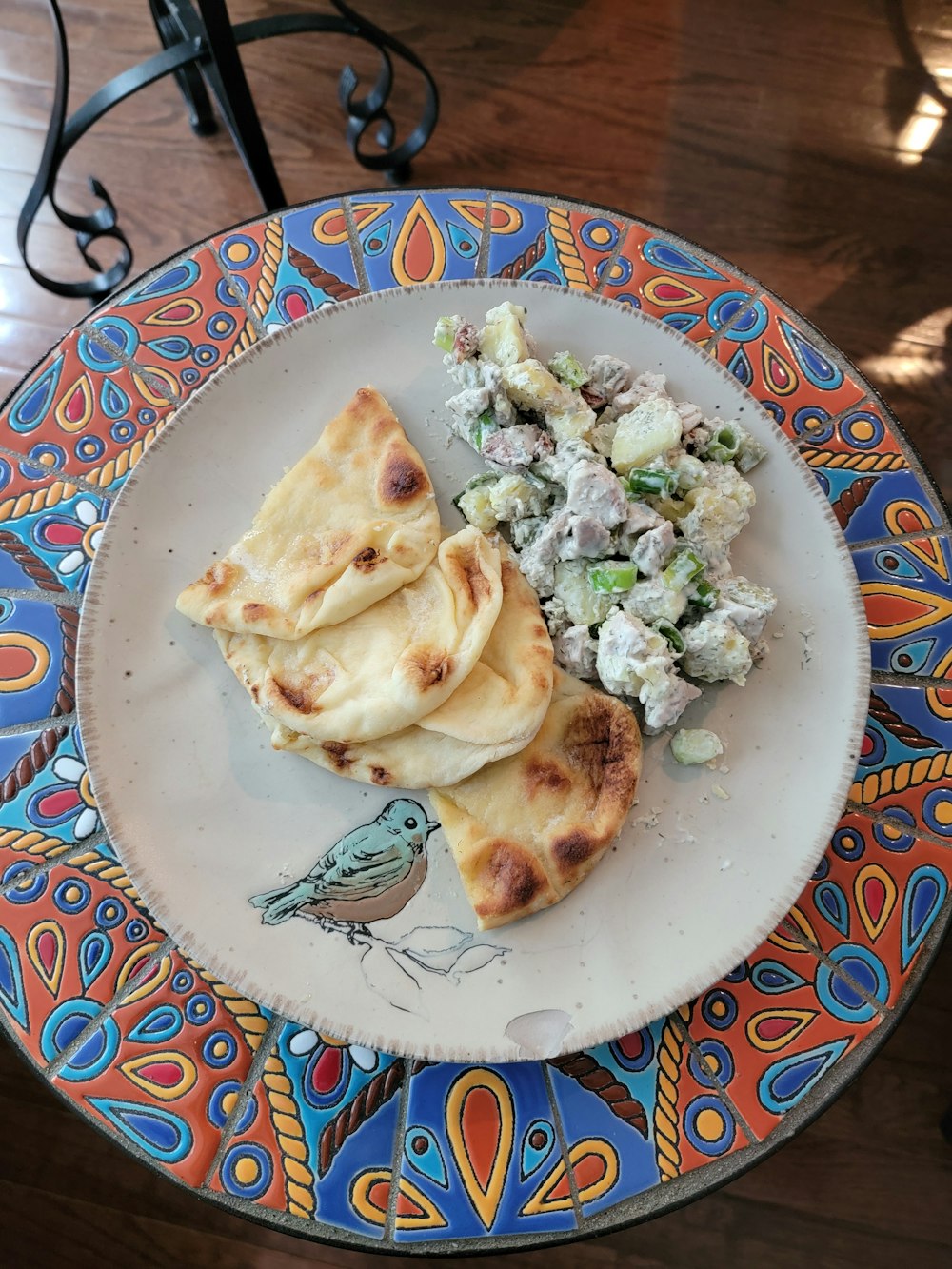 white and blue floral ceramic plate