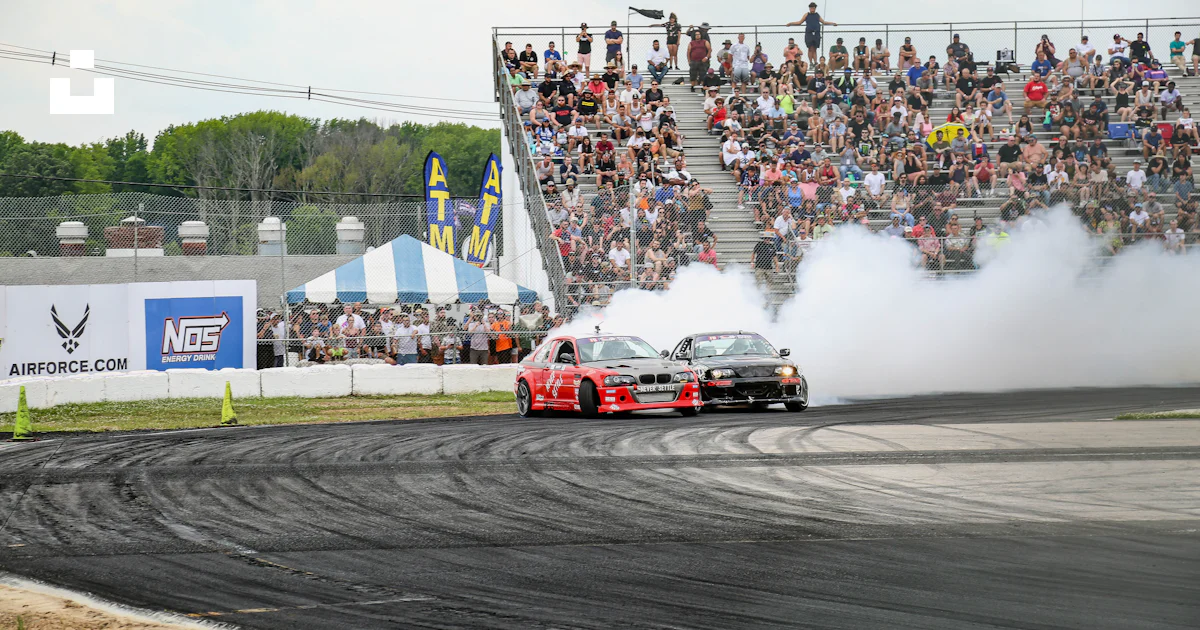 Red and white racing car on track during daytime photo – Free Usa Image ...