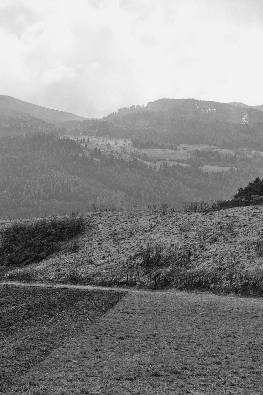 grayscale photo of mountain ranges