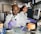 A team of scientists collaborating in a modern laboratory setting.