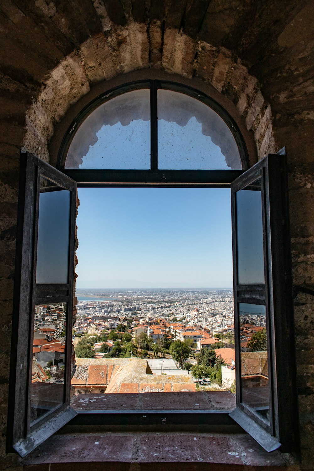 black wooden framed glass window