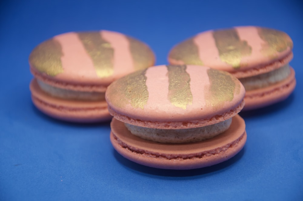 3 brown and white macaroons
