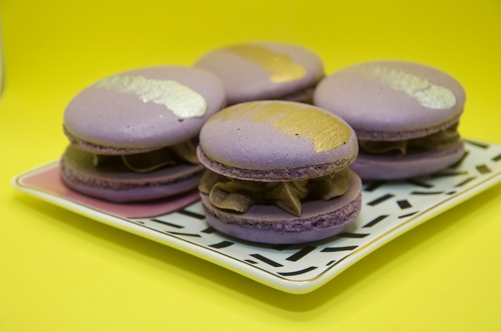 brown and white cookies on white and blue ceramic plate