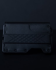 A sleek leather wallet featuring a crisp, laser-engraved monogram.