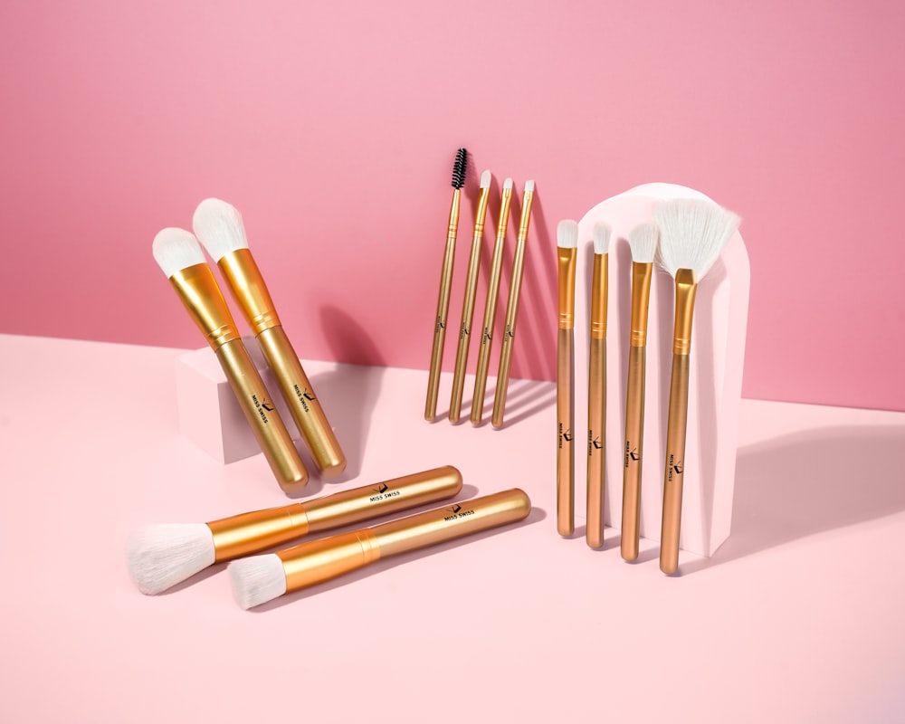 brown and white makeup brush set