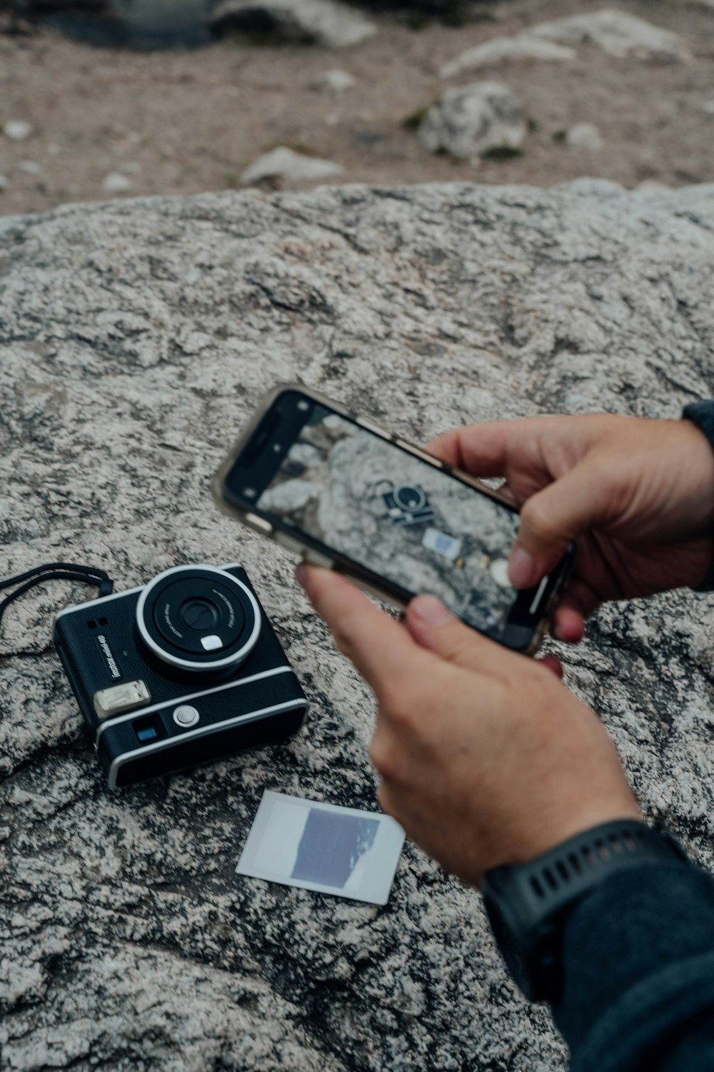 person holding black iphone 5