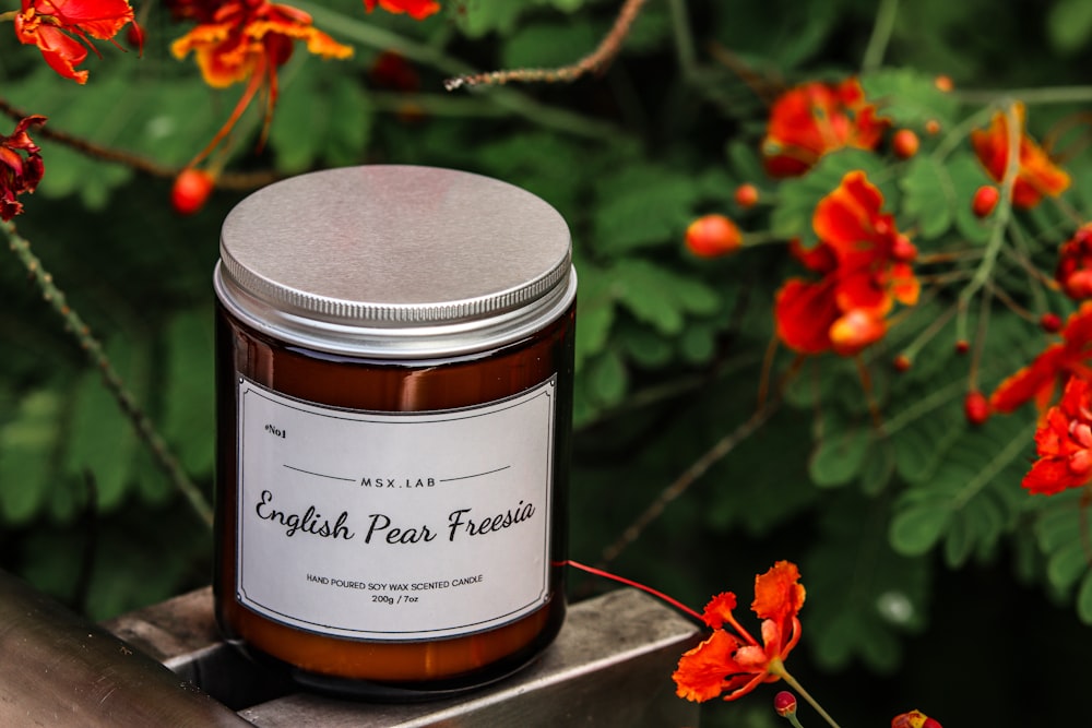 a jar of english pear preserves sitting on a table