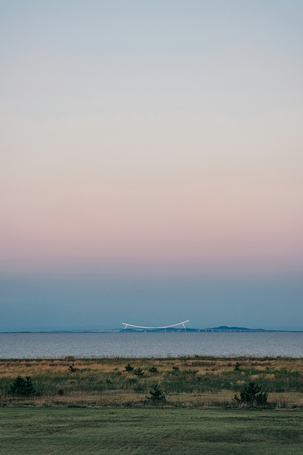 white boat on sea during daytime