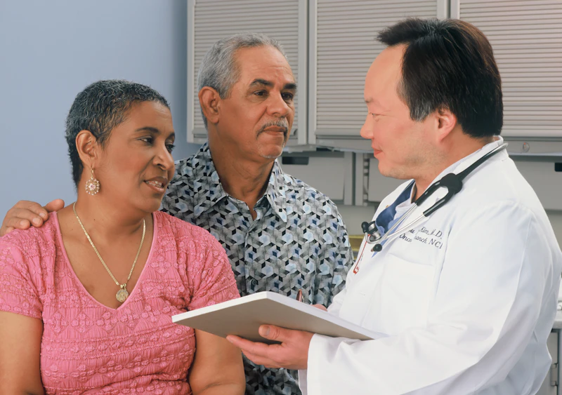 Family consulting with their doctor at Genesis Family Practice