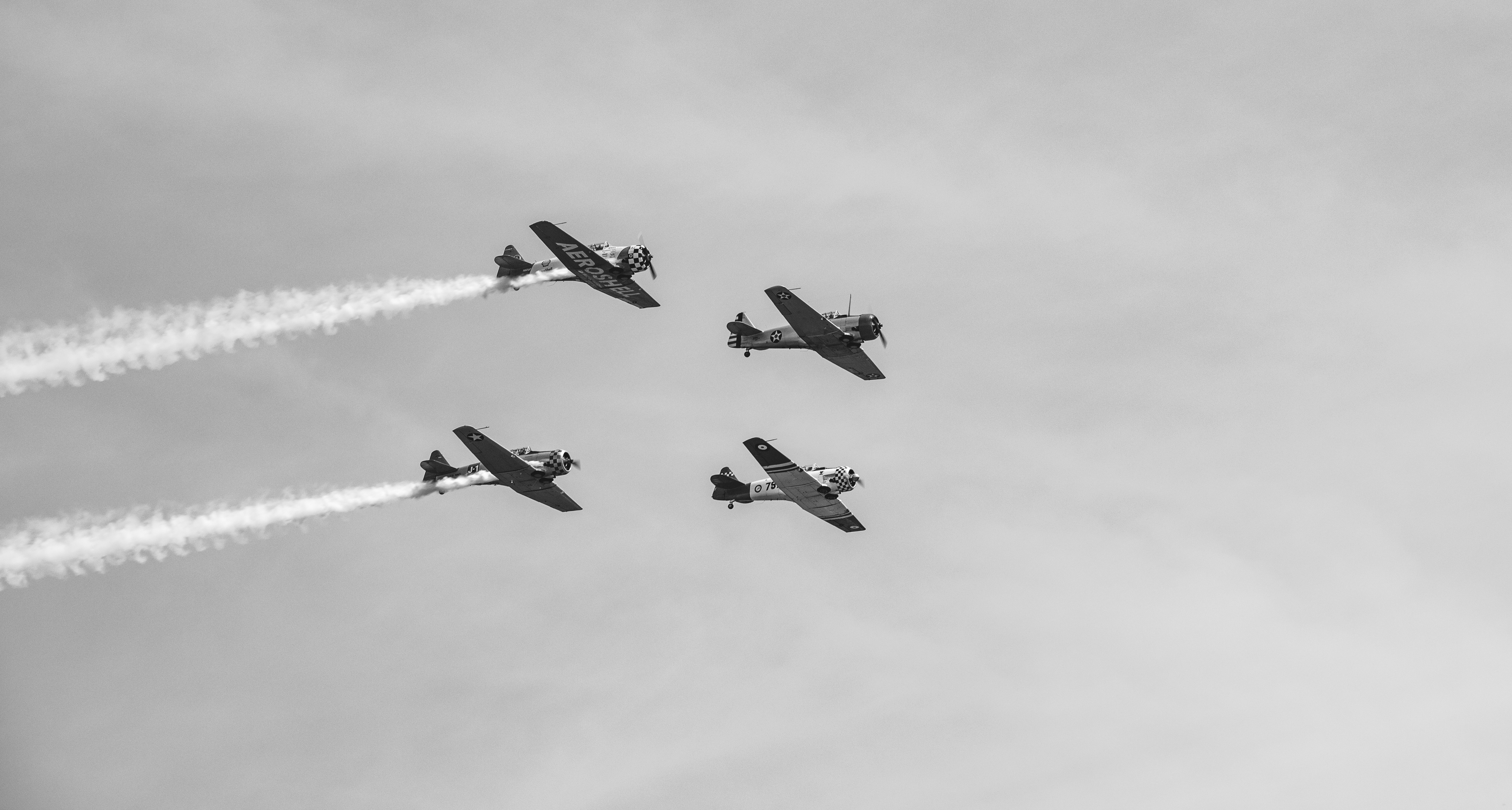 four fighter planes in mid air, 