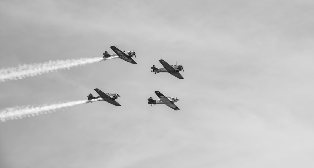 four fighter planes in mid air,