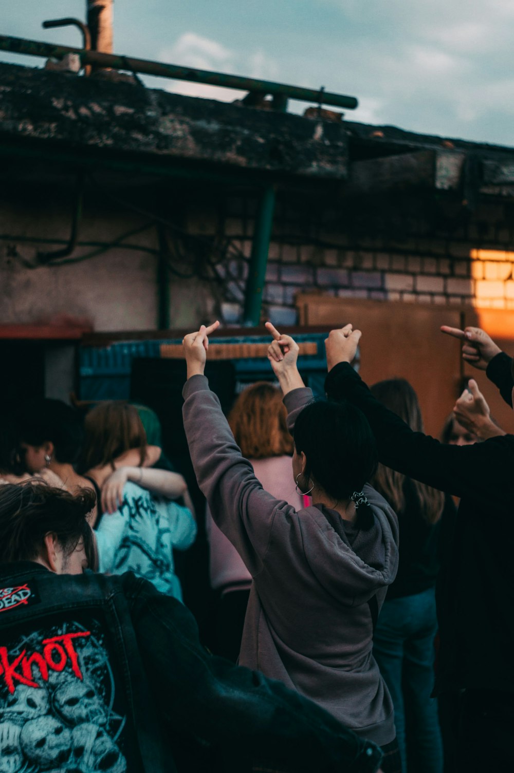 people gathering in a concert during night time