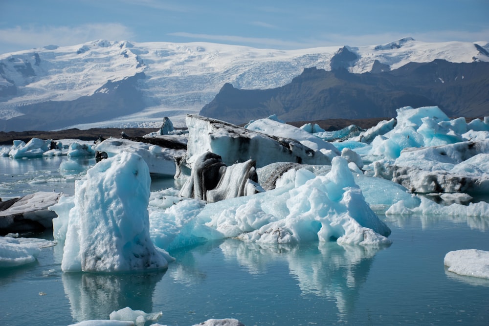 white ice on body of water during daytime