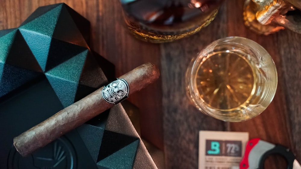 a close up of a cigar on a table